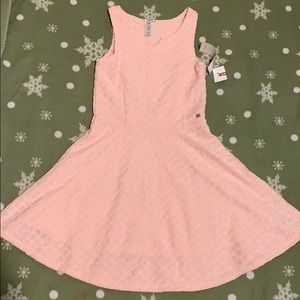 A formal little pink dress